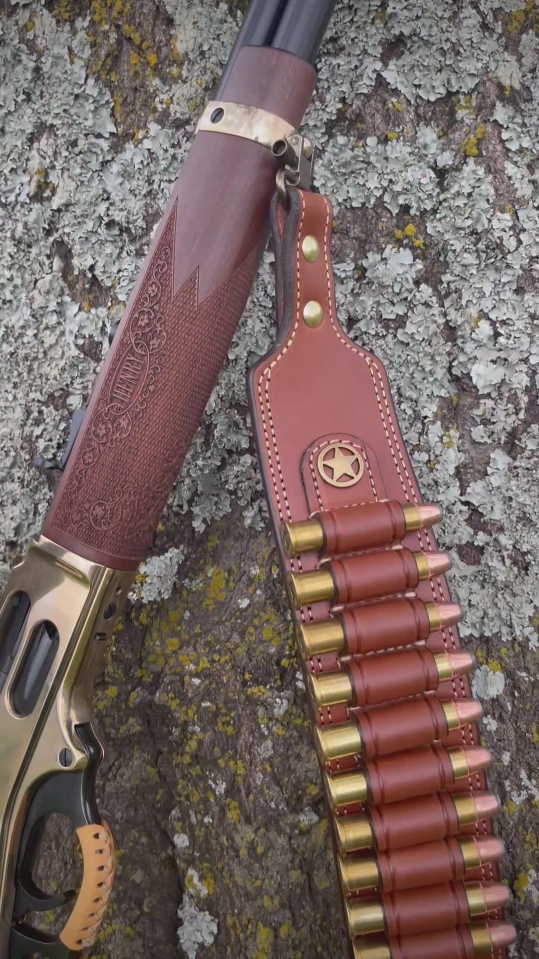 Close-up of leather rifle sling with ammo loops and star concho, paired with Henry Big Boy Brass Rifle, handcrafted by Busted B Leather.